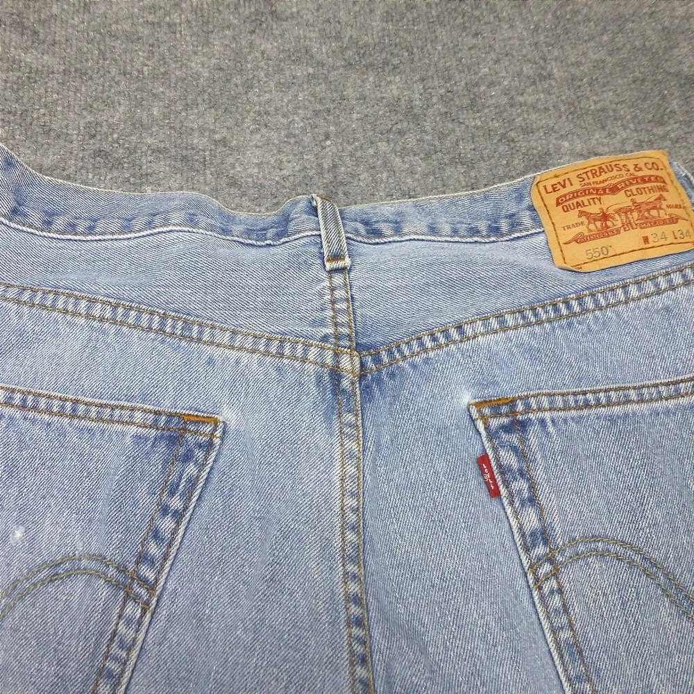 90's Levis 550 Relaxed Fit Jeans Mens 34x34 Light Wash Blue Denim